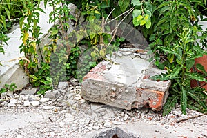 ÃÂ¡onstruction garbage, debris and waste rubble in a remote green forest area. Nature and soil pollution concept. photo